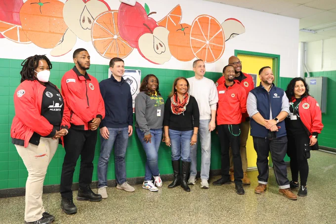 Deputy Secretary Graves poses for a photo with city year members