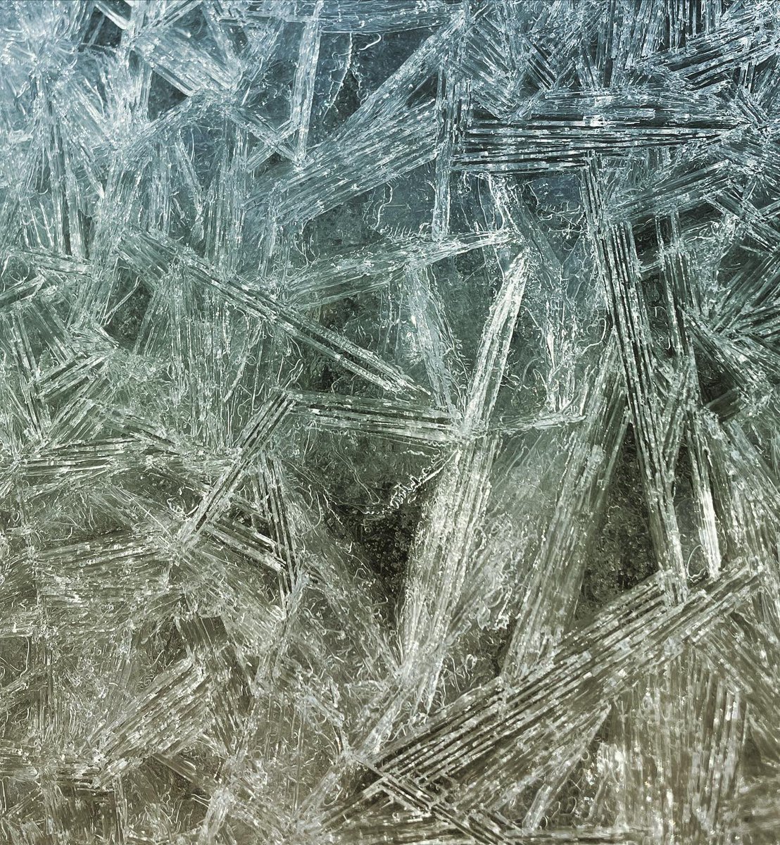goavs925's tweet photo. Ice shapes from the snow runoff along the driveways on my street. It melts a little but the drains are blocked with snow so it backs up in to the driveways and freezes again. #iceshapes #wintertime #COwx @LaurenCBS4 @DaveCBS4 https://t.co/m4PkC8T3gF