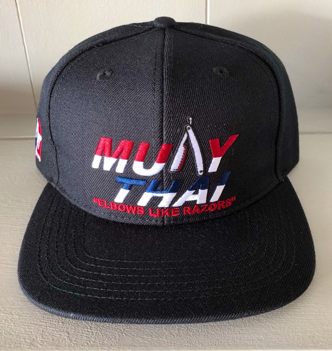 Anchoring4Life's tweet photo. High Quality Elbows Like Razors Muay Thai Snap Back Hat (With The A as a Straight razor covered in blood) https://t.co/x5LsgXY4R0 #bjjpatch #fighter #ANCHORING4LIFE #streetwear #bjjpatches #jiujitsupatches #bjj #Etsy #jiujitsupatch #JiuJitsu https://t.co/MF9ZdlynY3