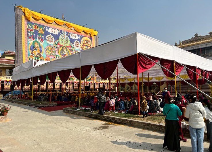 LamaZopa's tweet photo. The 100,000 tsog offering puja to Padmasambhava is being offered in front of a gigantic Padmasambhava thangka. This thangka, stitched in appliqué and is 75 feet high &amp; 87 feet wide. It took 2 years to create &amp; was completed in 2013 &amp; blessed by His Holiness the Dalai Lama. https://t.co/ZtJQO16uML