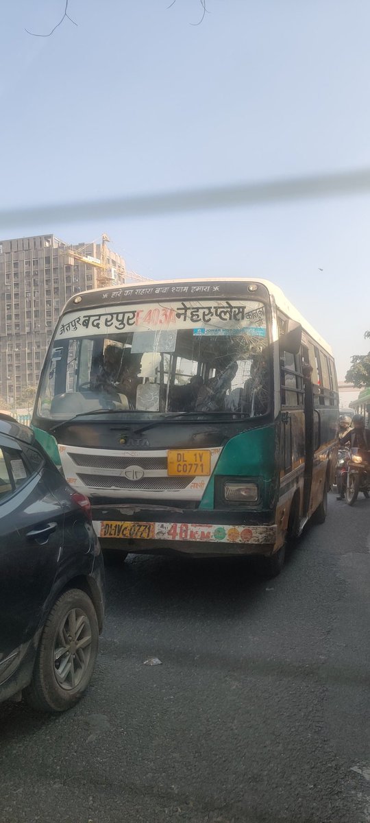 sayeshasuri's tweet photo. The bus driver having DL 1V C 0071 was badly driving the vehicle at Nehru Place red light and has hit my car and even tried to thrash the same between his bus and DTC bus. Kindly take necessary action @DelhiPolice @dtptraffic https://t.co/1zEX8PWqHO