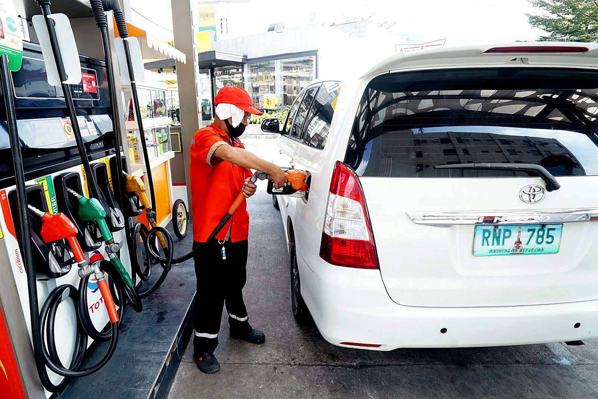 Philippine News Agency on Twitter "[1/2] ADJUSTMENT. A worker fills up