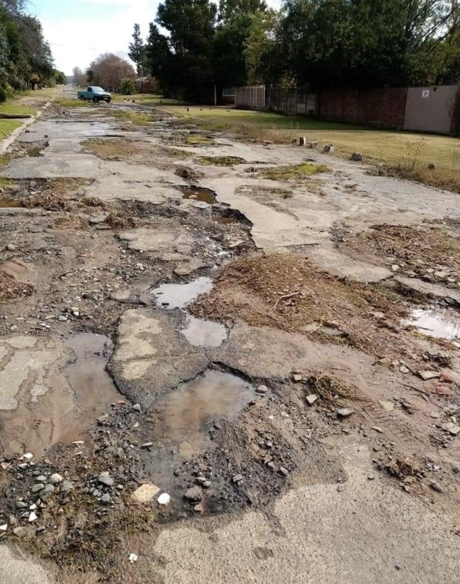 HotJollie's tweet photo. @SANRAL_za Not sure if this one counts as a pothole? Ladybrand, Free State. https://t.co/0KYCMITfQx