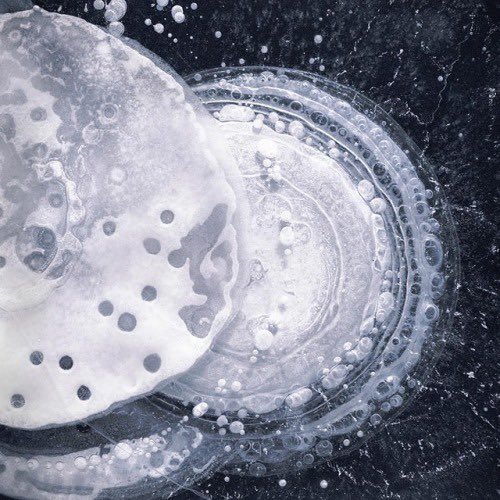 presentcorrect's tweet photo. Bubbles frozen in Alaskan lakes. https://t.co/maWNWDse0h https://t.co/RzEbuFhxmT