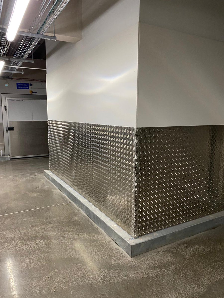 A previous job for <a href="/AldiUK/">Aldi Stores UK</a> at a new store, where we installed our 2mm thick aluminium chequerplate sheet to walls. Silicone joints ensure joints between sheets stay free of dirt &amp; water, &amp; external corners were finished with a bespoke manufactured angle in the same material.