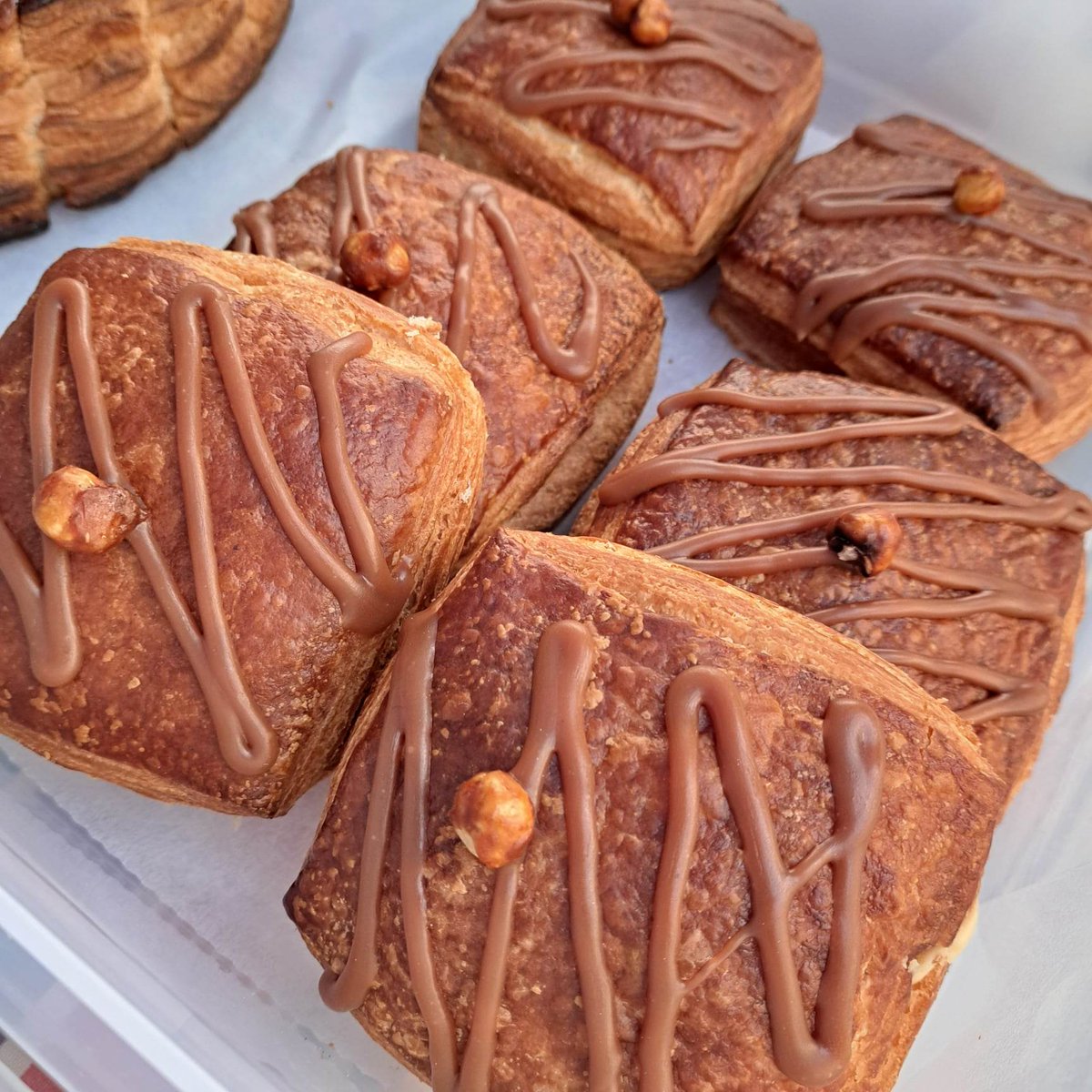 EnnisMarket's tweet photo. Lots of new treats at @cappalaheen including traditional New Year #cake Franjipan, hazelnut and toffee pastries and Black forest!
Of course, you can also pick up their amazing sourdough #bread
#sourdough #localbaker #artisanfood #ennis #farmersmarket https://t.co/72E3HUKPlE