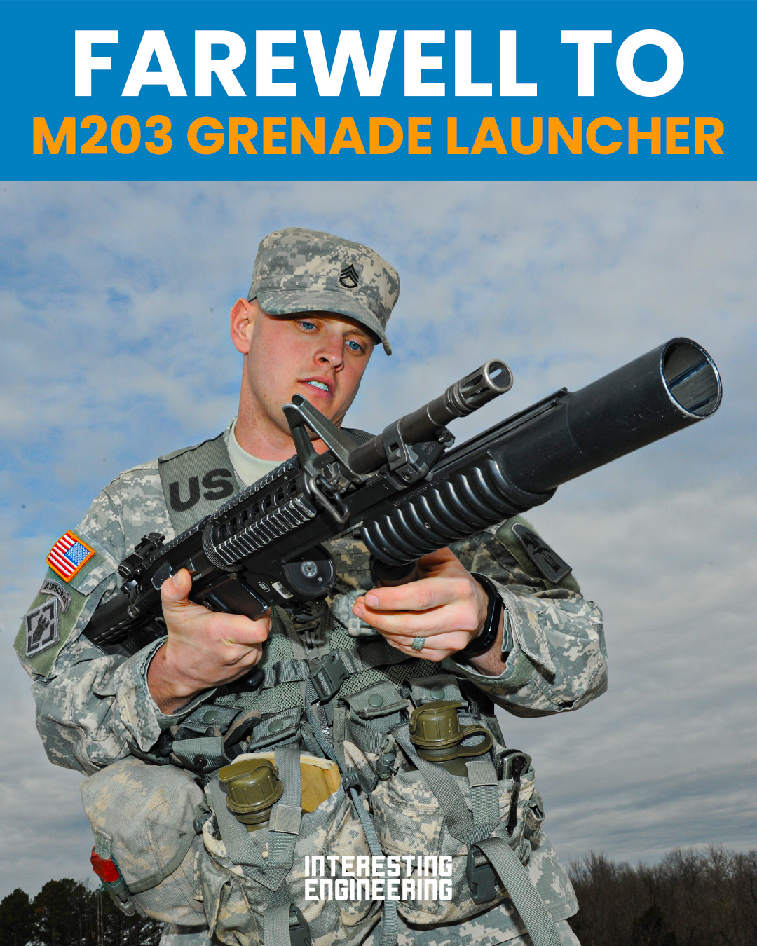 M203