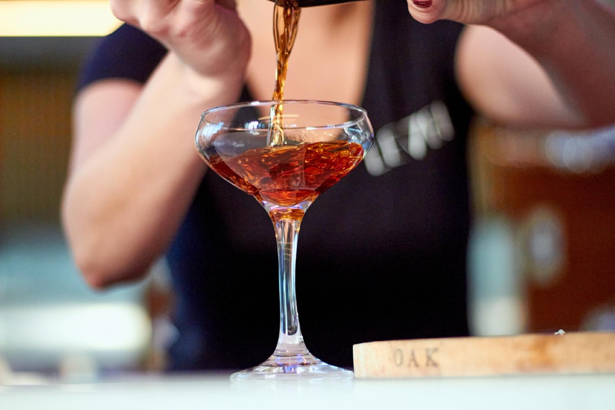 Level7RoofBar's tweet photo. That's one smoking 🔥 #cocktailpour! 

⬜ Sip: #SmokedManhattan - @redemptionwhiskey, Antica Vermouth, Angostura Bitters, Bordeaux Cherry

Elevate to the seventh floor and fire up your week! 

#Level7RooftopBar #raleighnc #manhattancocktail https://t.co/s3PYLIKJAJ