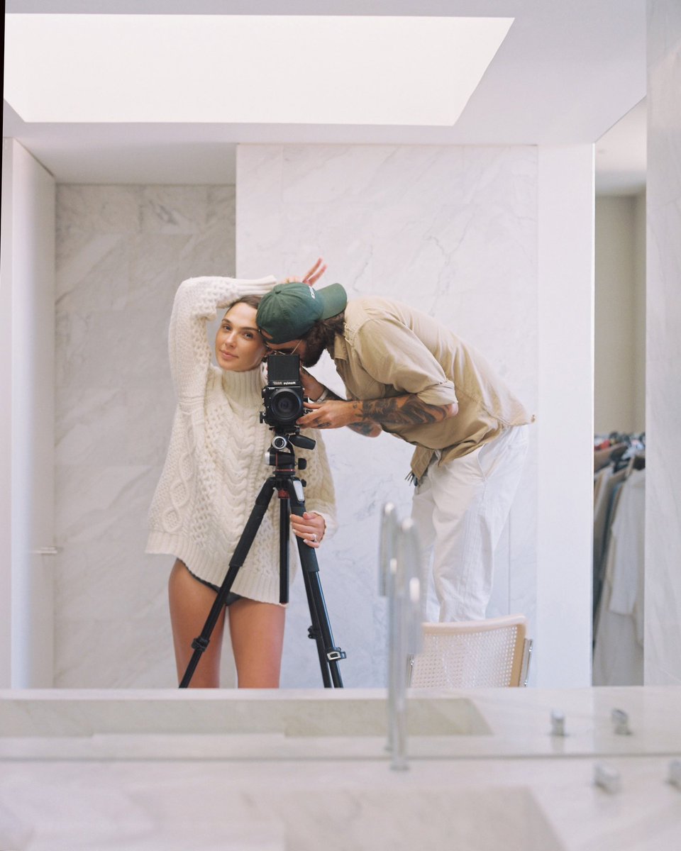 the Dude and I 🤍 
We worked together on one of my very first modeling jobs and 20 years later he is still my photographer and close friend.
 Dudi has the ability and talent to capture me in the most unique moments and this is a little BTS photo of one of those rare moments