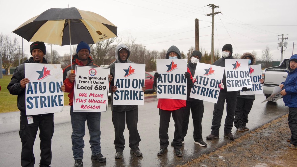 ATUComm's tweet photo. ‘One day longer, one day stronger.’ Despite rain and cold, our striking Local 689 Loudoun County Transit workers are standing strong on the line for a fair contract. #1u #UnionStrong @Virginia_AFLCIO #StrongerTogether https://t.co/Lb7auKESdo