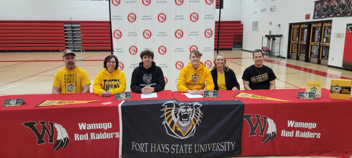 WHSAthleticsOf1's tweet photo. Congratulations to Emery Wolfe and Brady Stegman on signing today to continue their education and run Cross Country at FHSU! @WamegoXC @fhsuathletics https://t.co/uJi2Bf7YIA