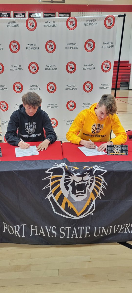 WHSAthleticsOf1's tweet photo. Congratulations to Emery Wolfe and Brady Stegman on signing today to continue their education and run Cross Country at FHSU! @WamegoXC @fhsuathletics https://t.co/uJi2Bf7YIA