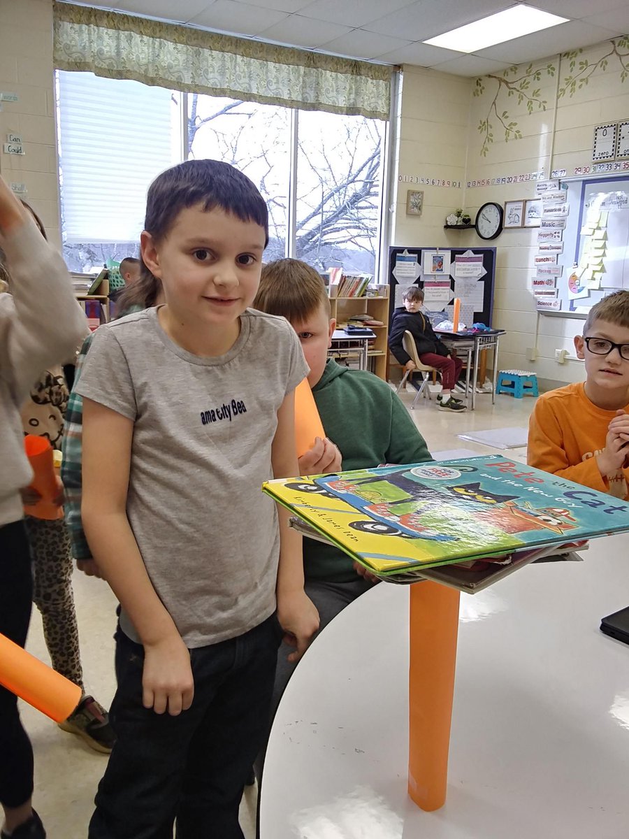 Last week STEM classes built paper towers in different shapes to see which was the strongest. One group was able to stack 35 books on theirs! 📚