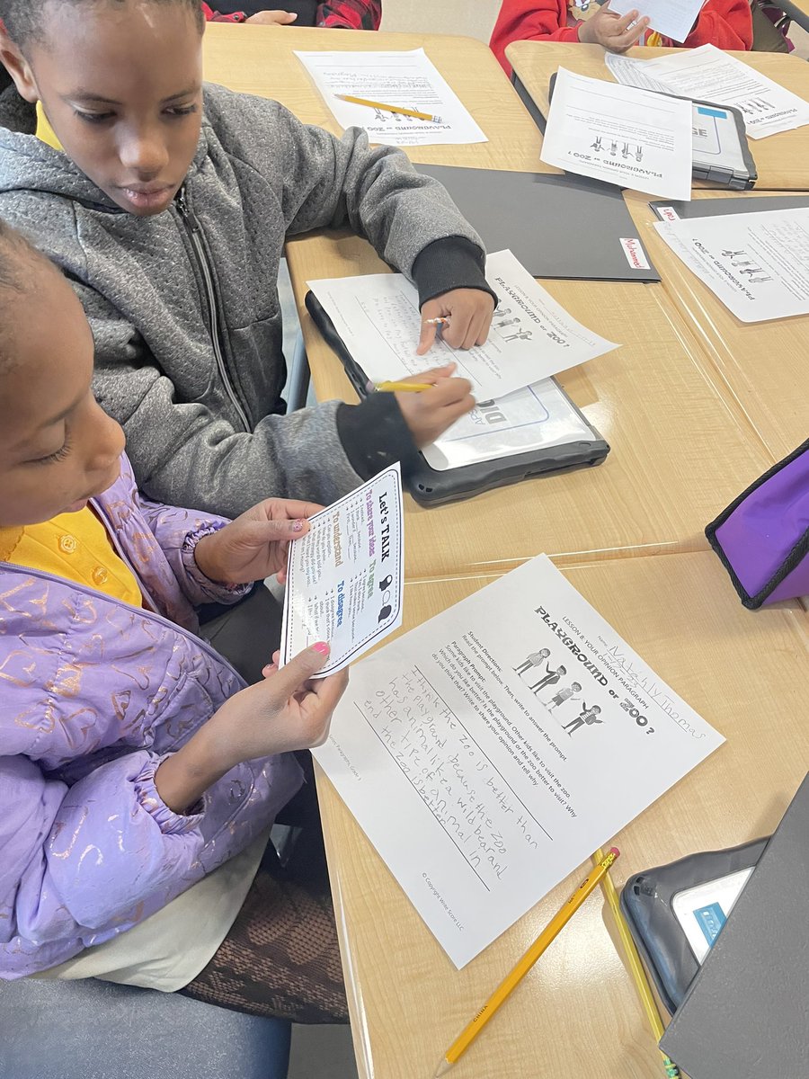 Using our “Let’s Talk” cards to guide discourse during opinion writing!