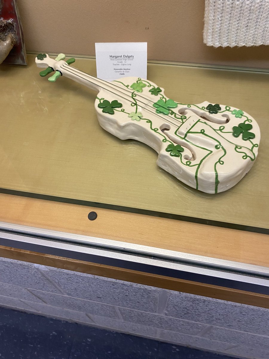 Jdalgety22's tweet photo. So proud of our Maggie. Showing off her ceramic Irish fiddle. Nice tribute to her ancestors and the gift of art. @KCongel #prouddad #Maggierocks https://t.co/KFjotYQEkE