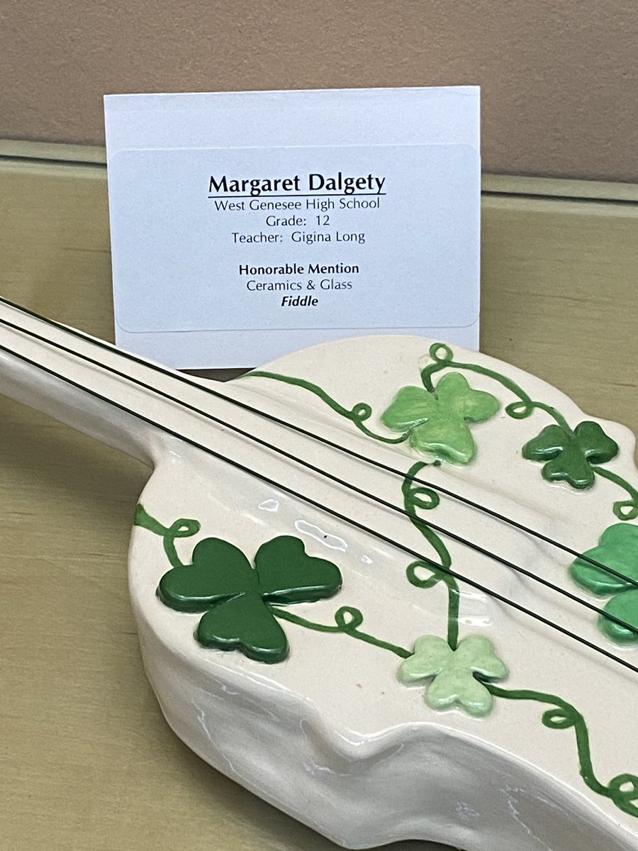 Jdalgety22's tweet photo. So proud of our Maggie. Showing off her ceramic Irish fiddle. Nice tribute to her ancestors and the gift of art. @KCongel #prouddad #Maggierocks https://t.co/KFjotYQEkE