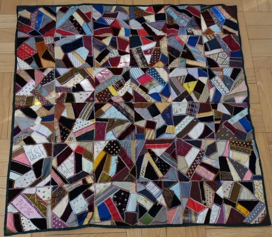 HistoricNE's tweet photo. These #patchworkquilts, aka “crazy quilts," are made of embroidered silk satin fabric and velvet patches. One has the initials “H.E.E.” embroidered on it and one has the date “1892” inscribed in ink. The maker of both quilts is likely Helen E. Endicott (1868-1930) of Canton, MA. https://t.co/MppvWBtSuR