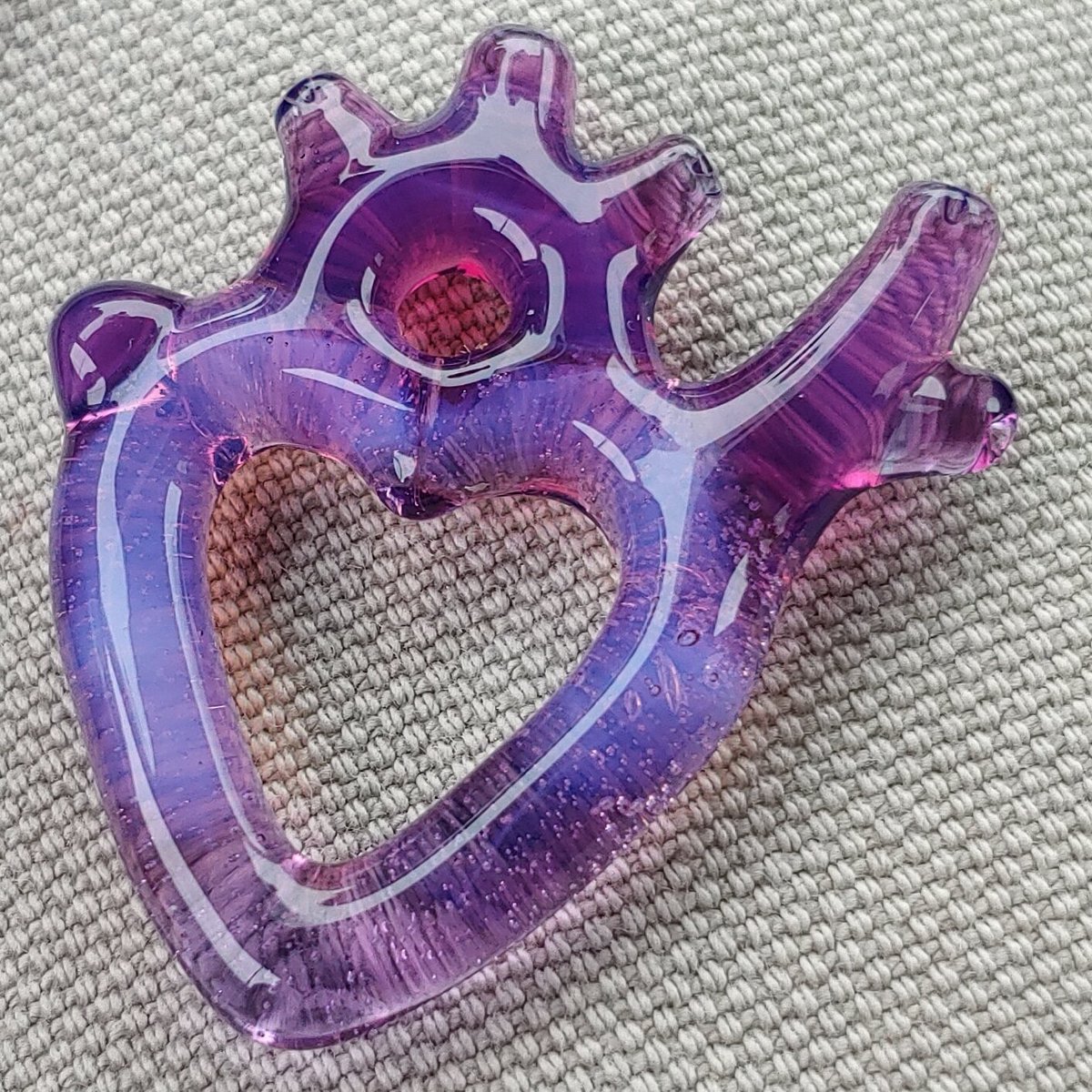 MandellaGlass's tweet photo. The back of a freeformed Heart to Heart pendant. Be on the lookout Friday evening for our next drop. https://t.co/7oS4TXde0y