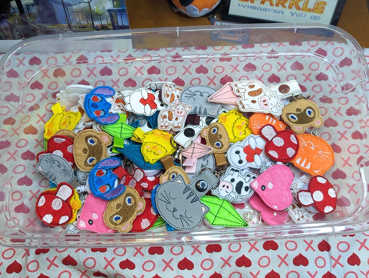 WadingHawk's tweet photo. Look at all the designs we've finished so far for the embroidered badge reel clips and hair clips shop update on Friday! If you look closely, you might notice a unannounced new type of product. Any guesses?
#embroidery #shopsmall #shopsmallbusiness #giftideas #valentinesdaygift https://t.co/G7smCv4AuP
