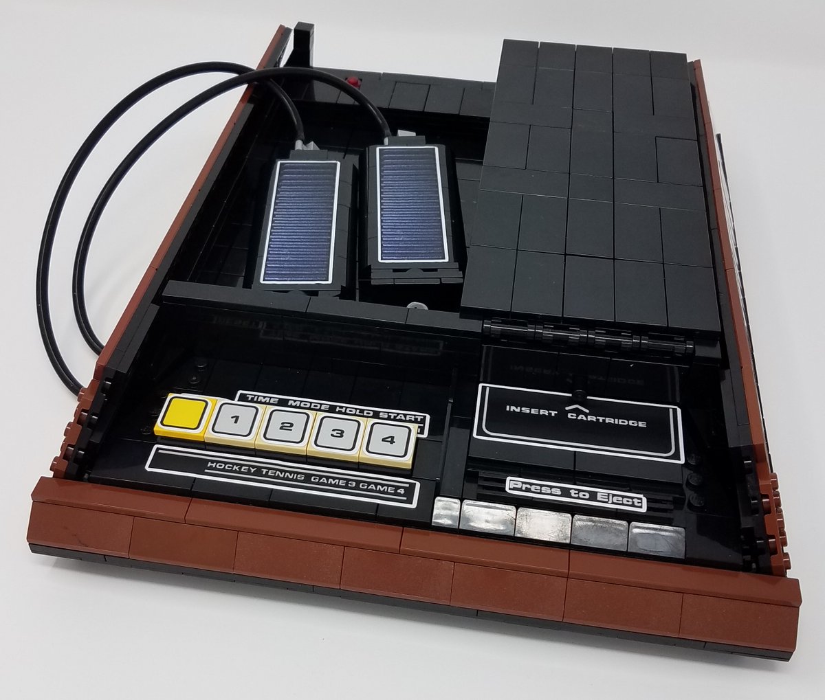 ChannelFLLC's tweet photo. The iconic 1970s Channel F™ video game console &amp; controllers and Videocart™ cartridge like you've never seen them before: made completely out of toy bricks!

https://t.co/kjvHJk5FtZ

#channelf #retro #retrogaming #videogames #moc #toybricks #lego #legomoc #legobuild #legobricks https://t.co/BC4AzQSAqL