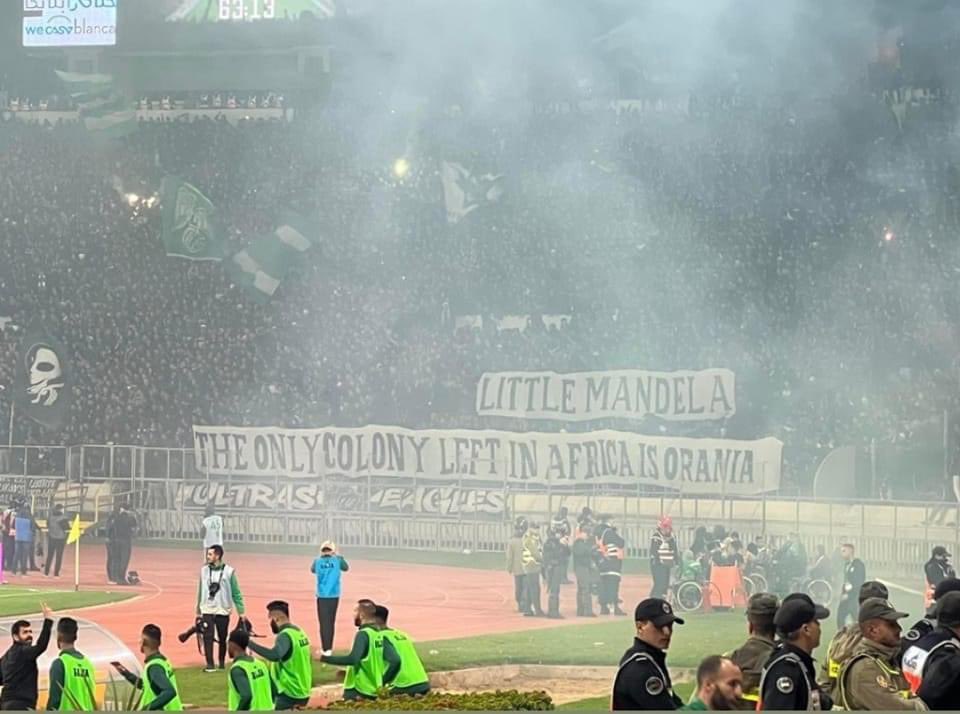 AfricaViewFacts's tweet photo. Message from Raja Casablanca fans to Nelson Mandela's grandson, after referring Morocco 🇲🇦 controlled Western Sahara as Africa's "last colony"

"Little Mandela, the only colony left in Africa is Orania"

Orania is the whites-only town situated along Orange River in South Africa. https://t.co/NJnU2V6ASa
