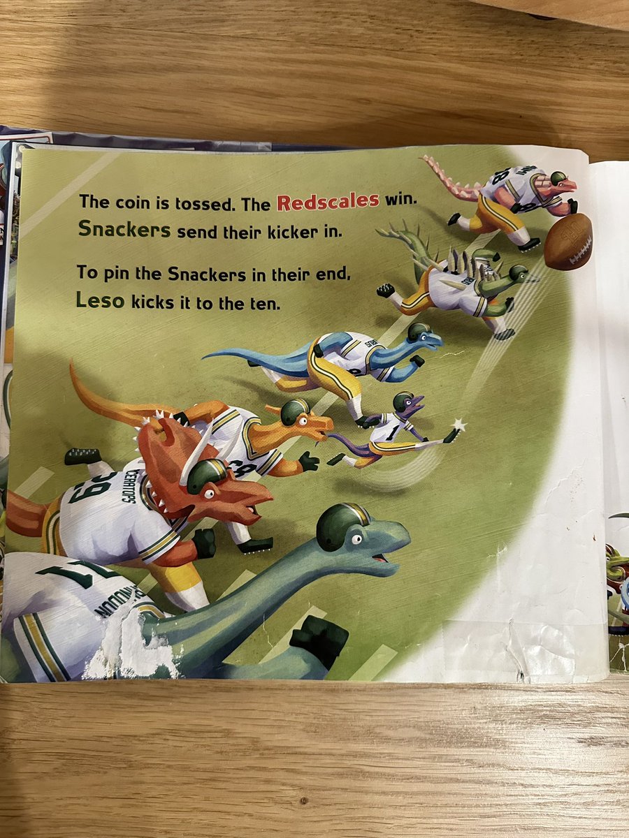 ken_mah's tweet photo. @LisaWheelerBook My 4.5 year old daughter ❤️s your books! In Dino-Football, the Snackers are kicking off so she thinks 3rd line should actually be changed to “to pin the Redscales (not Snackers) in their end,” Agree? https://t.co/qZDryw53ep