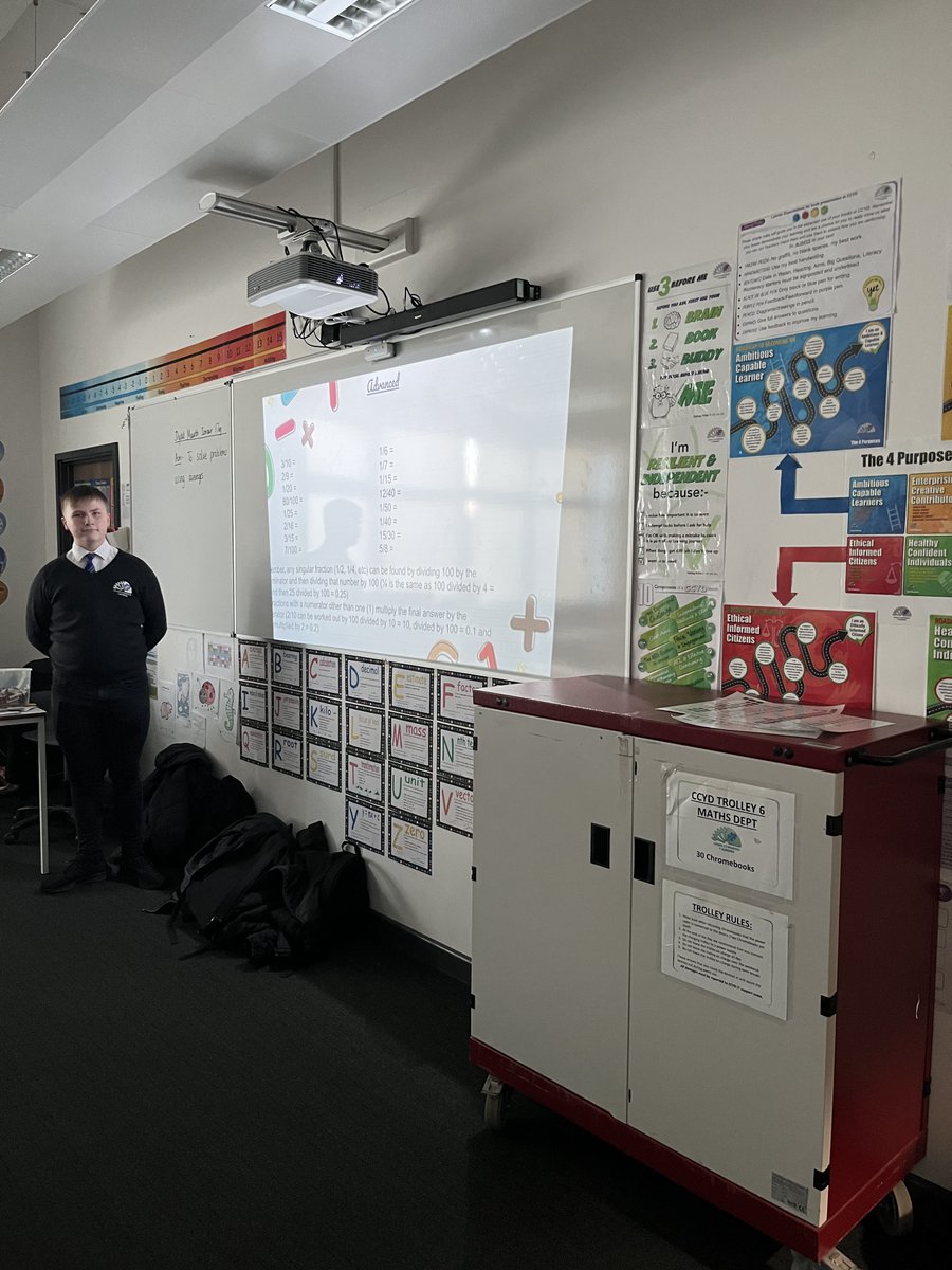 Another great session with our Numeracy Prefects in Maths Club - changing fractions to decimals!  Da iawn everyone - lots of sweets and raffle tickets given out.
<a href="/CCYD_Maths/">CCYD Maths</a> <a href="/CCYD_school/">CCYD</a> <a href="/CCYD_WelshBacc/">CCYD Welsh Bacc</a>