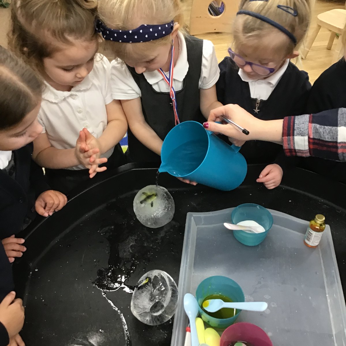 Nursery_BBSM's tweet photo. As part of our topic on Winter we have been investigating how ice melts. We rescued the animals from the ice balloons. We tested fairy liquid, warm water, sugar, salt and food colouring. We used our senses and discussed what would happen. #smbbscience #smbbearlyyears https://t.co/XPD8mE8Z5V