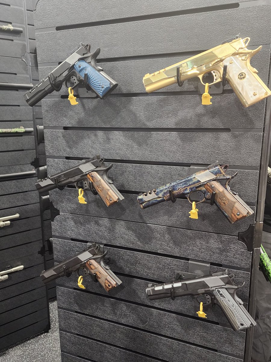 Iver Johnson has got some unique finish patterns on the 1911.  These will look great at 5280 Armory!! #iverjohnson #snakescales #bling #gold #shotshow2023