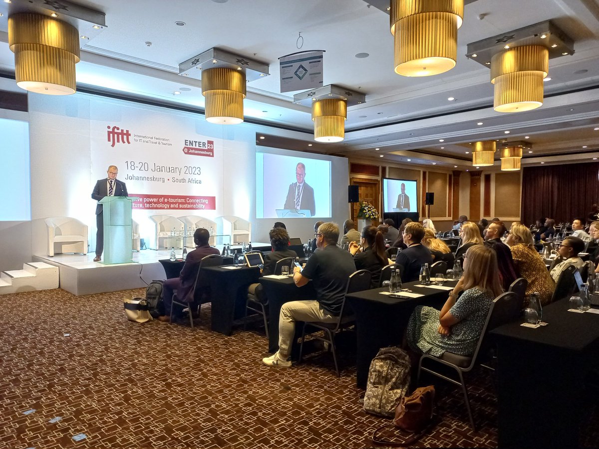 Juho Pesonen, <a href="/IFITTorg/">IFITT</a> President is on the podium to officially open the #ENTER23 E-Tourism Conference, welcoming just over 400 delegates from across the world. #ENTER23 #Tourism #Etourism