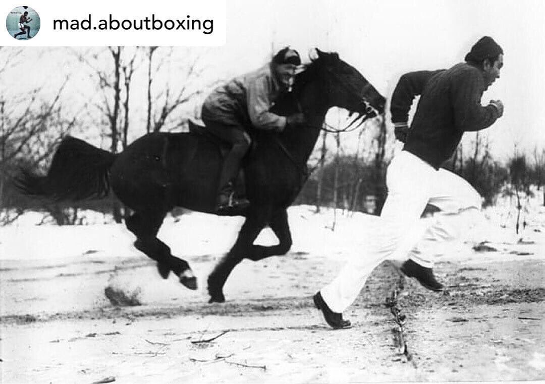 🥊 Rocky Marciano seen here out getting in that all important roadwork in the snow…racing a horse in big old heavy boots! Old skool style…. #madaboutboxing #Marciano #Rocky #champion