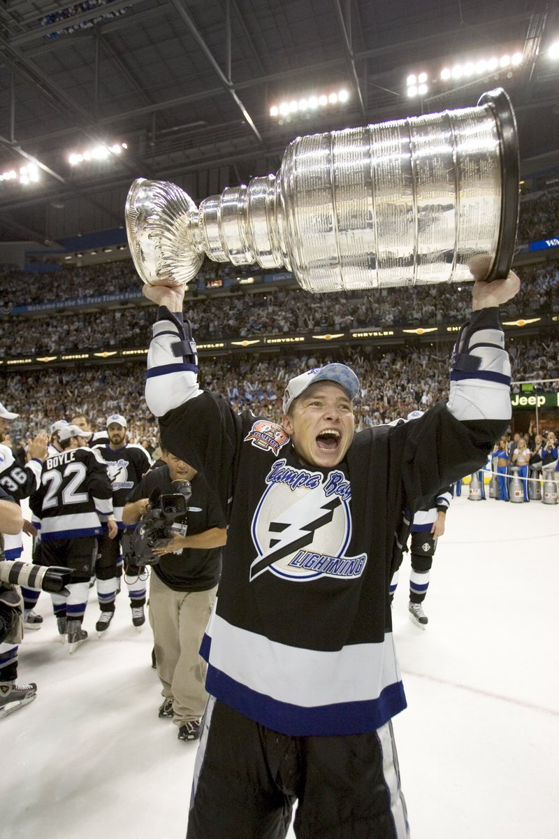 Chris_Krenn's tweet photo. Happy Birthday to Ruslan Fedotenko, who scored both #Bolts goals in Game 7 of the 2004 SCF vs. Calgary. Fedotenko's 12 playoff goals that year were tied with Brad Richards for the team lead. He scored a team-high six goals in the ECF vs. Philly, who traded Fedotenko to TB in '02. https://t.co/uf8I4CgFda
