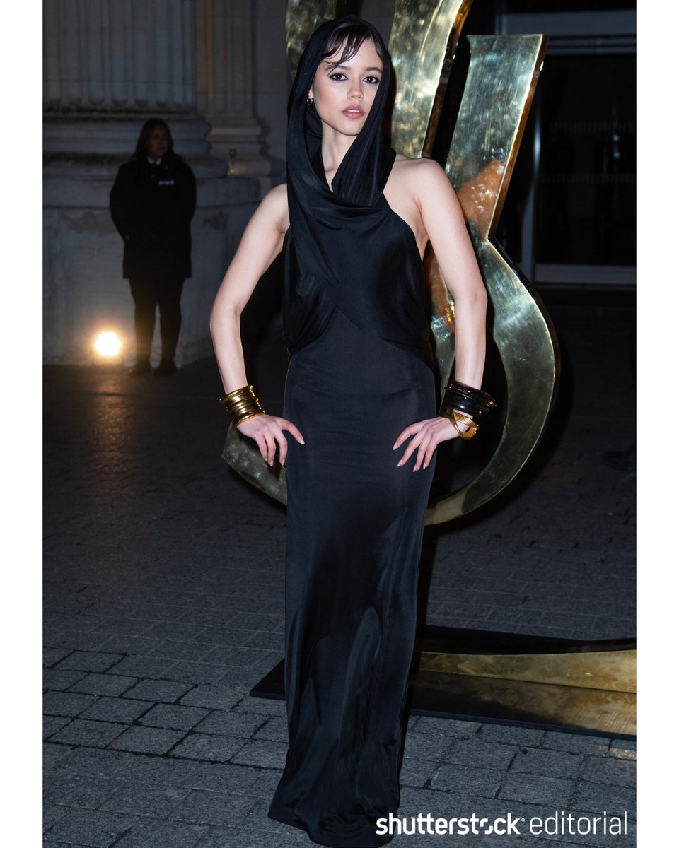 𝕾𝖙𝖚𝖓𝖓𝖎𝖓𝖌! <a href="/jennaortega/">marie</a> attends the <a href="/YSL/">SAINT LAURENT</a> Men's show in a sleek hooded dress at the Men's Paris Fashion Week. shutr.bz/Entertainment

📸 <a href="/Shutterstock/">Shutterstock</a> 
- Marechal Aurore/ABACA