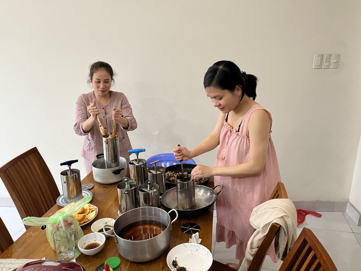 layered's tweet photo. Preparations for Tết: making già thủ, what westerners call head cheese, with lots of pig’s ears and black mushrooms. https://t.co/mCzImvL3j3