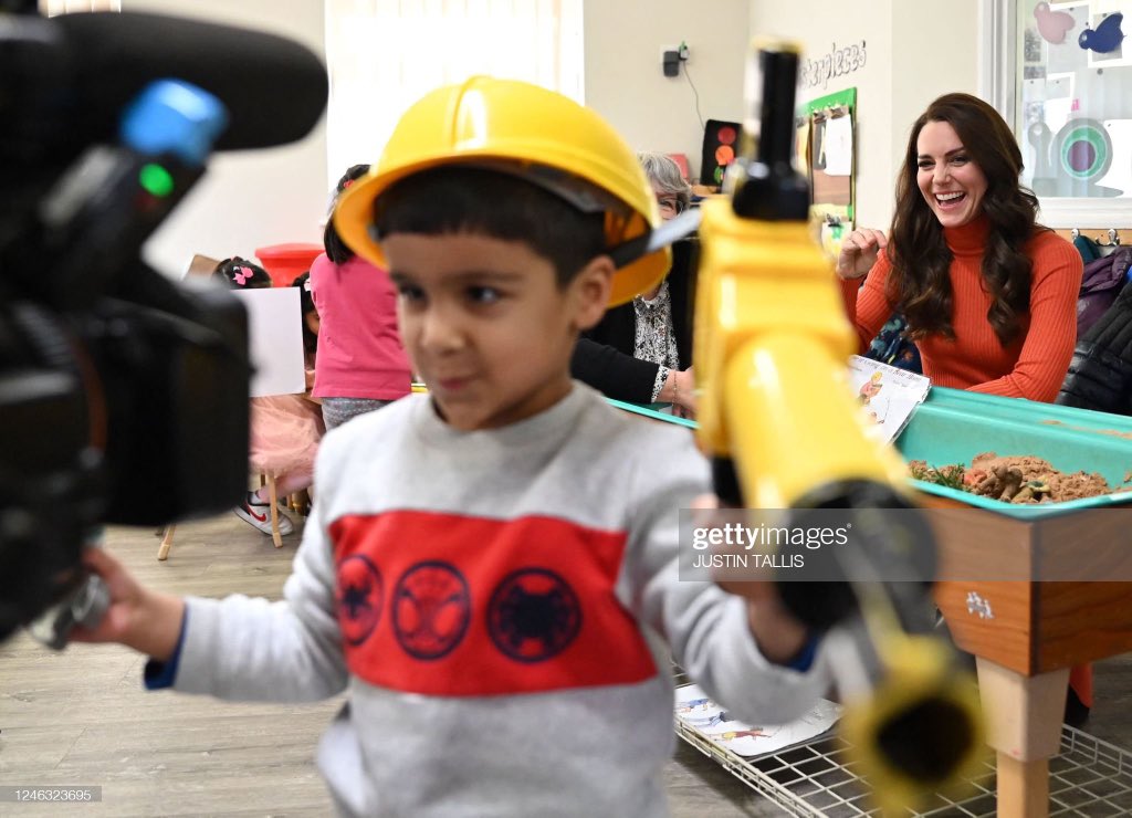 When Ezaan, 3, holds toys in front of the media during The Princess of Wales is visiting the Foxcubs Nursery in Luton today.