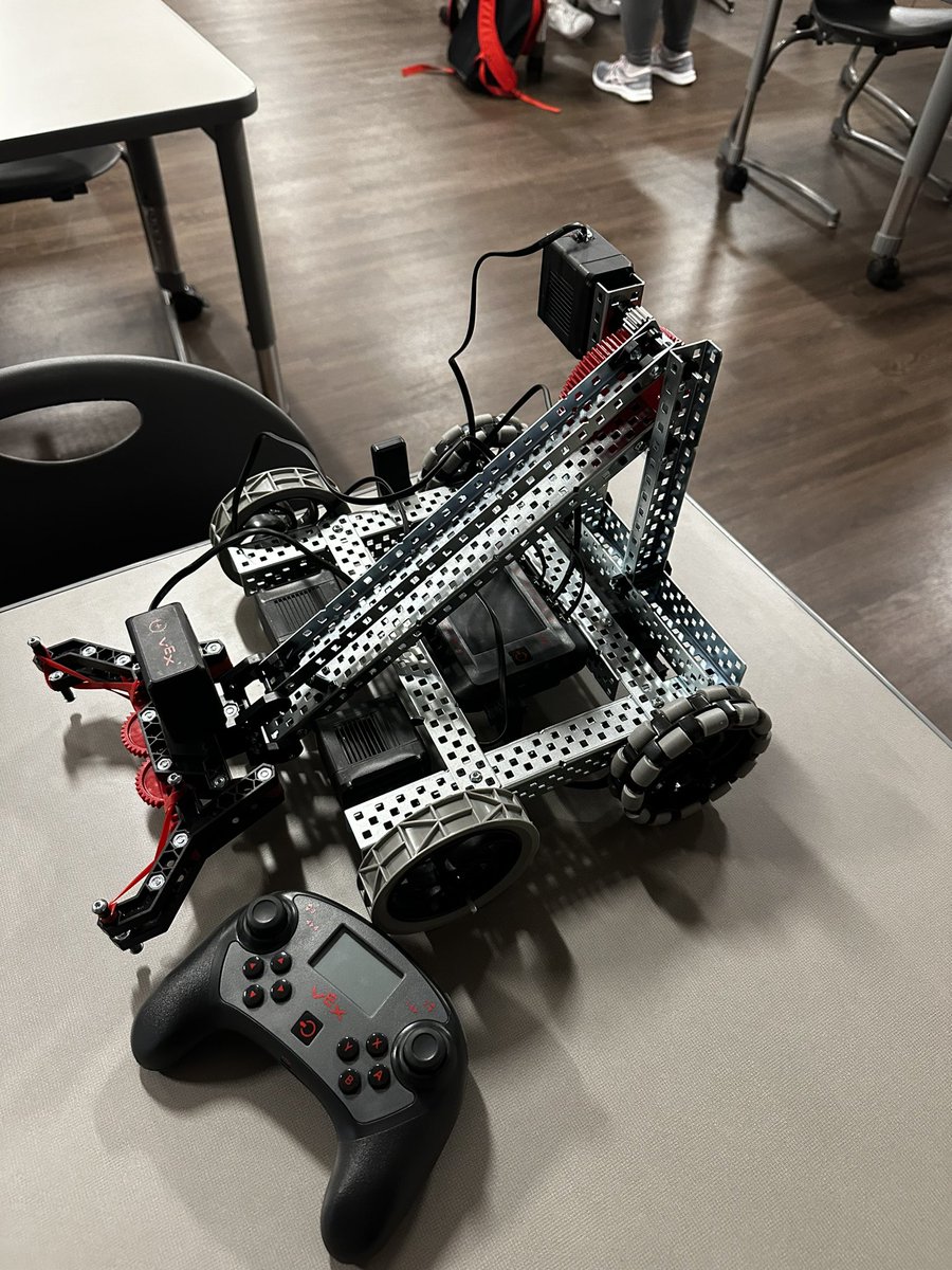 Students are building their Vex 5 robots to program in C++