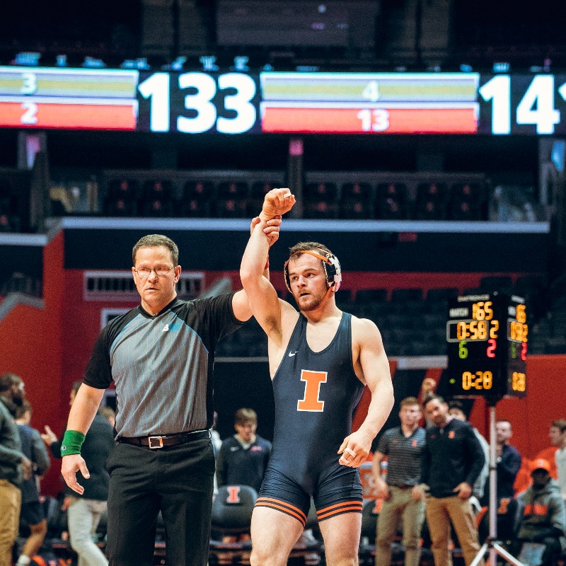 IlliniWrestling's tweet photo. Coming 🔜

Away vs No. 15 Northwestern
Home vs No. 23 Maryland

#Illini | #HTTO