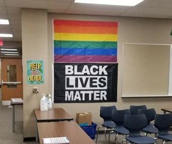 DC_Draino's tweet photo. Who thinks these flags are new-age religious symbols being unconstitutionally hung in a public classroom setting? https://t.co/SSuUxczAid