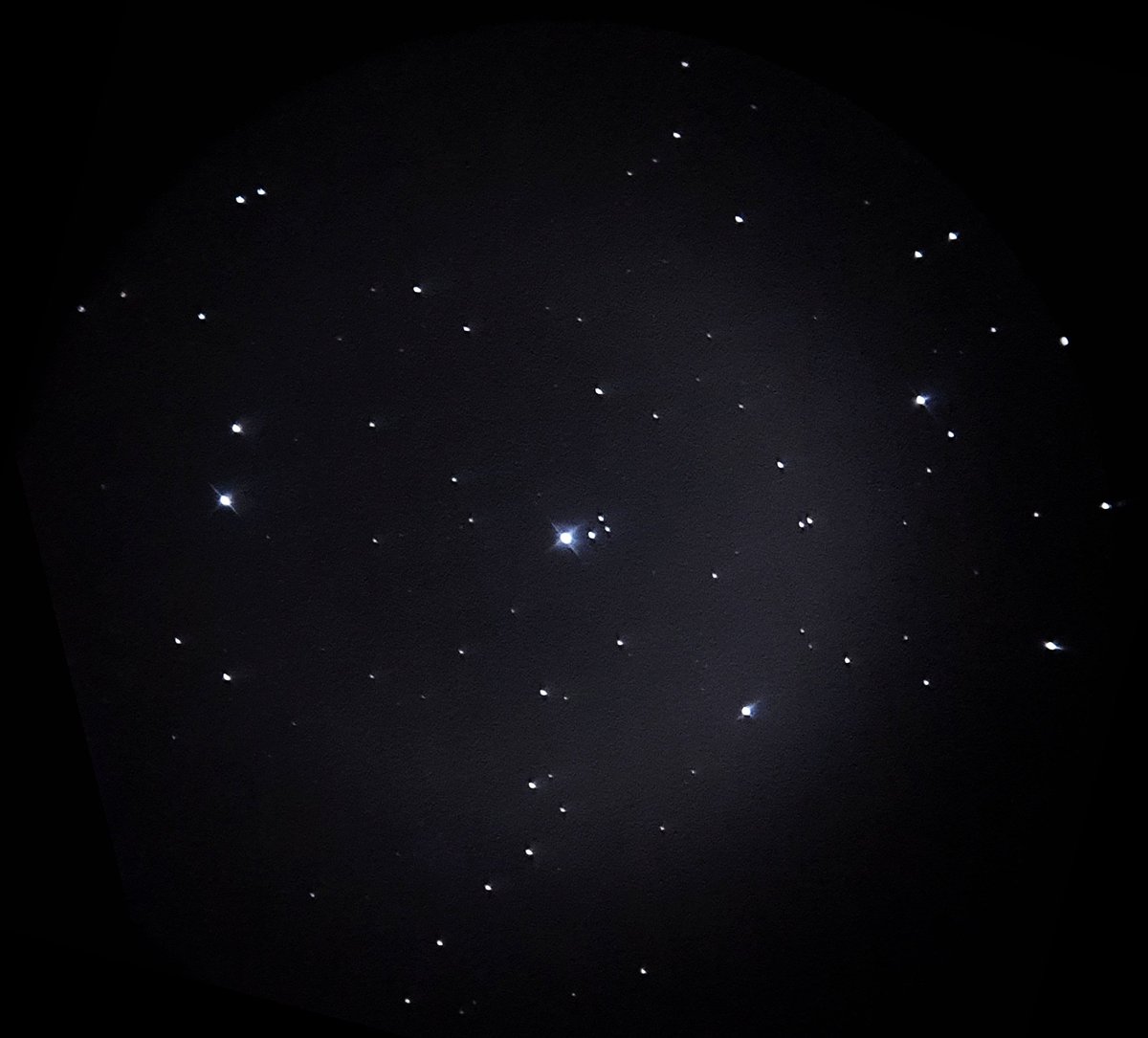 The seven sisters of the Pleiades open star cluster. Untracked 4 seconds exposure with 8' Dob scope, 40mm 'wide' lens and Samsung mobile #Astrophotography #Astronomy #AstroHour