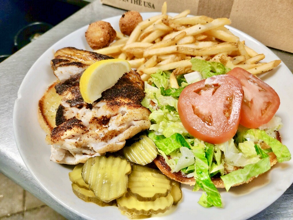 Our ~new~ grouper sandwich! 😋 
🎣 Fried, grilled or blackened and served with lettuce, tomatoes, and homemade tartar sauce.