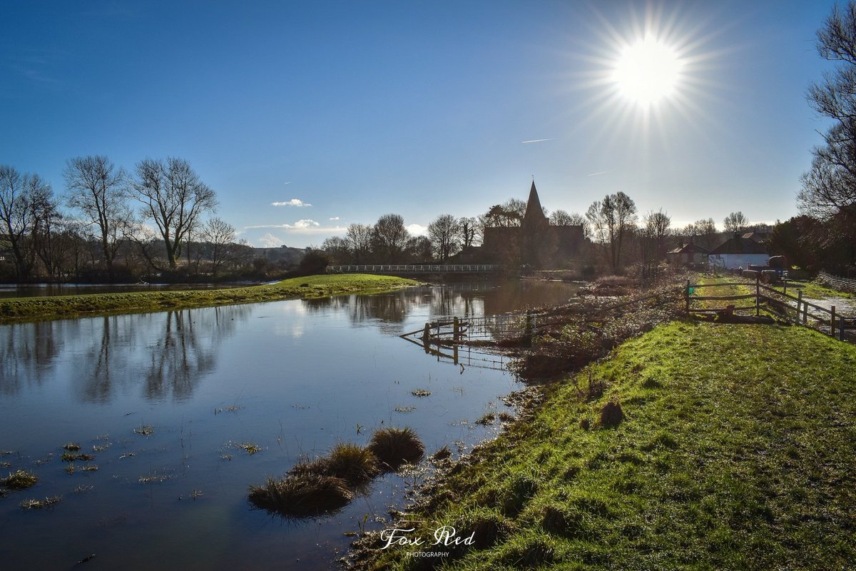 In the current climate of stress and negativity on socials, here's a snap I took today, of the beautiful (rather high) Cuckmere River running past Church of St Andrew in Alfriston. 
I hope it gives you peace and tranquility as it did for me. #Alfriston #sussex #Church #cuckmere