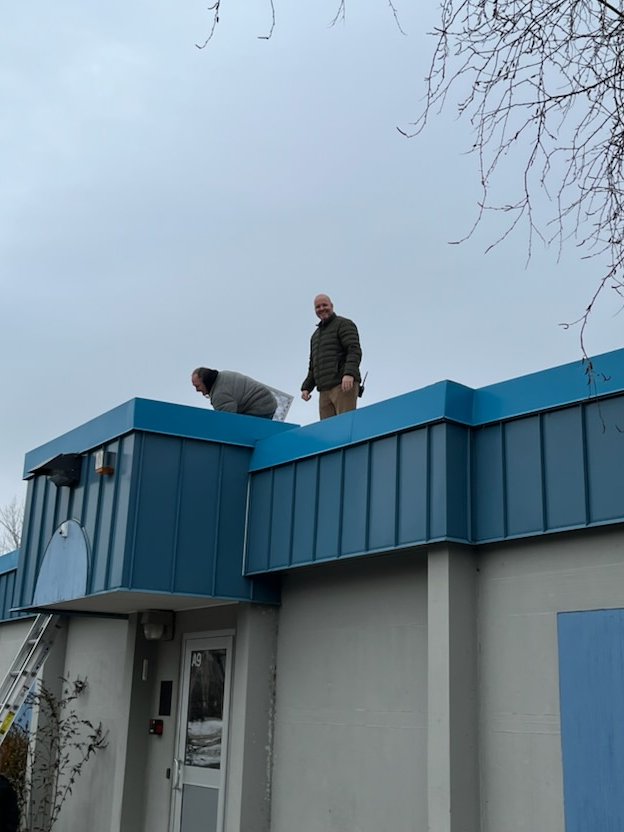 EKESCommunity's tweet photo. Mr. Mizzi and Mr. French got up on the roof to change the air filters today. The job of a principal doesn’t stop in the office! https://t.co/GrF8maYuYk