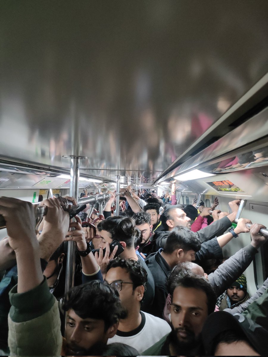 Priyam_Roy009's tweet photo. Just an usual day in Delhi Metro on Blue line. Forget about getting a place it's very difficult to stand even, old people find it very difficult to travel through this line as there's huge influx of people. Small request @OfficialDMRC @ArvindKejriwal please take care of it. https://t.co/Xtgsy1cUl2