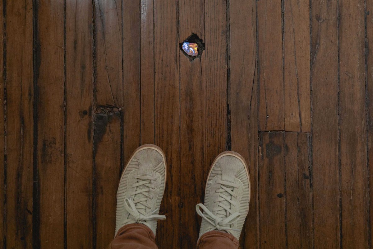 Don't forget to look down 👀 It's easy to miss this tiny work by #PipilottiRist, or even step on it! Her mini video lives in our lobby floor. It shows the artist yelling “I am a worm and you are a flower” as she swims in a lava bath. Check your floors, art could be hiding there!