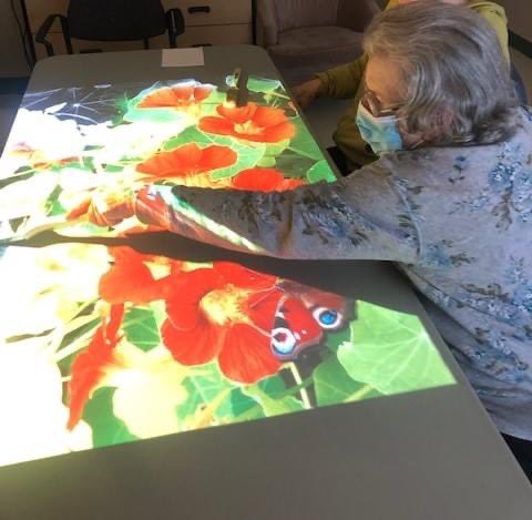 Butterfly Lane Residents showing off Shadow Painting skills and playing interactive games!