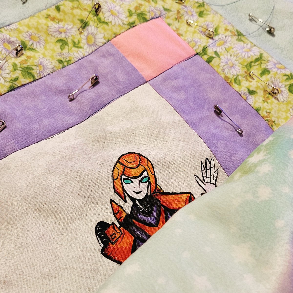 Sewing the sides of the #Transformers #babyquilt together

#quilting #transformerspainting #fabricpainting
