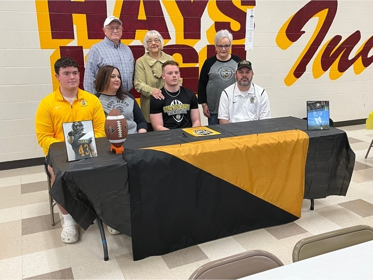 HaysHighAD's tweet photo. Congrats to Hays High senior Bryce Salmans and his family on signing his LOI to play football and continue his education at Fort Hays State University! https://t.co/0tb097y8km