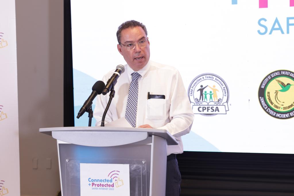 FLOWJamaica's tweet image. Speaking now is The Hon. Daryl Vaz Minister, Science, Energy and Technology. Minister Vaz spoke about the increase in digital attacks and its threat to the safe use of cyberspace. #ConnectedandProtected #FlowFoundation