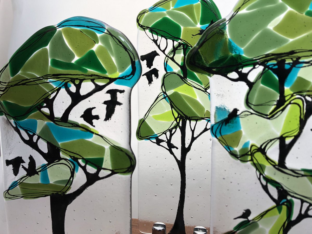 Biggarglasswork's tweet photo. Three trees and several crows. #crow #scottishbirds #trees #warmglass #fusedglass #scottishpinetree #fusedglasstree #glasstree https://t.co/pZgE6x3qMe