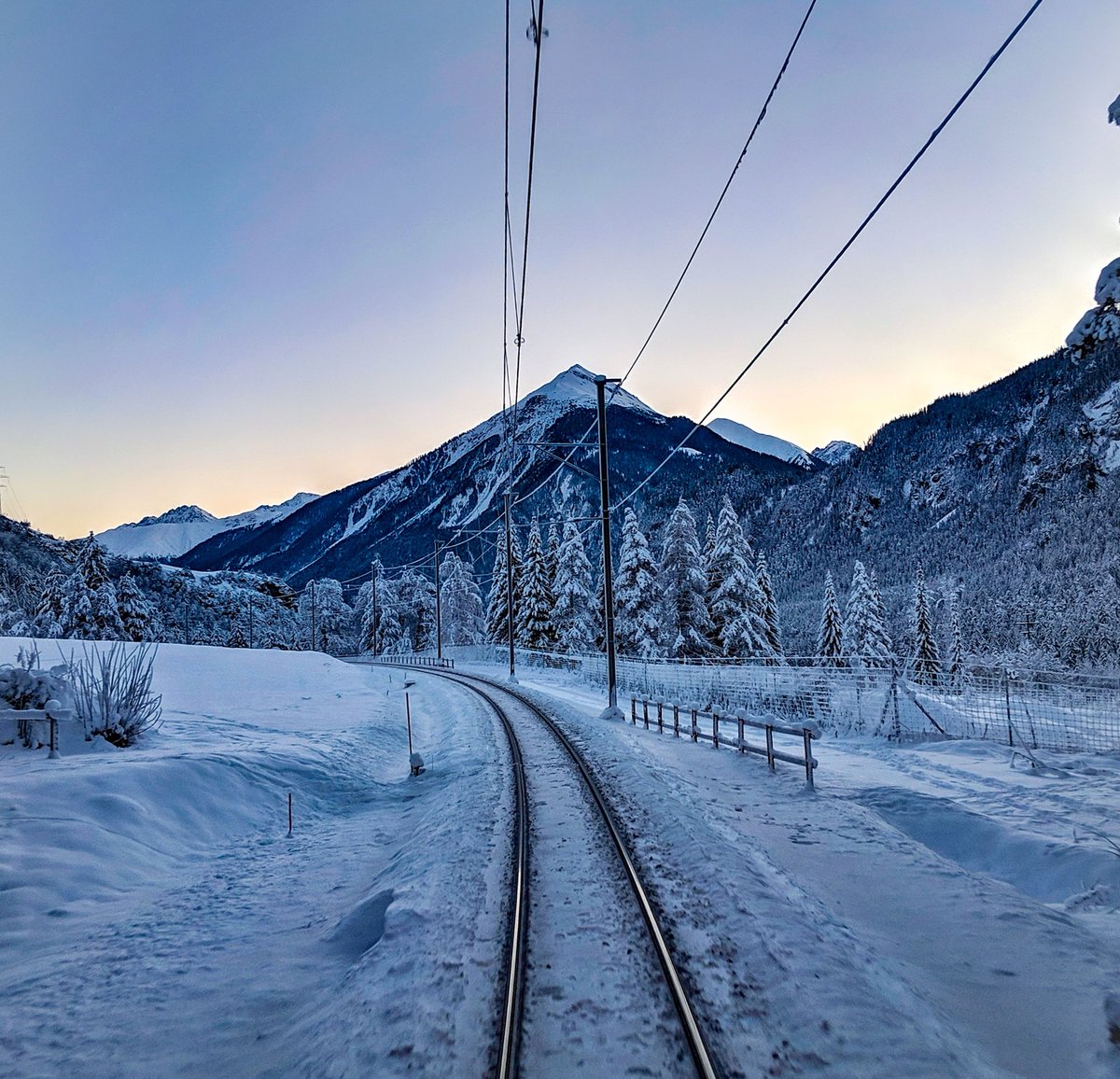 calandamountain's tweet photo. Looking forward for the next snowfall in @Graubunden. In the meantime, a snapshot on the Albula Line with Mt. Muchetta in the background. https://t.co/i9JAhTqeil